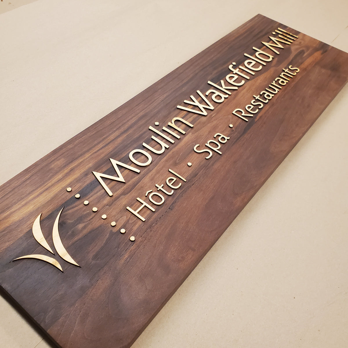 wood inlay signage hospitality Wakefield Mill