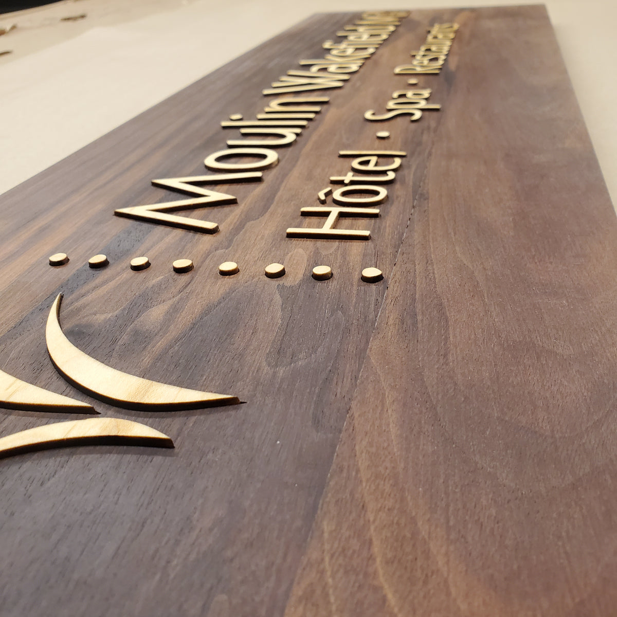 wood inlay signage sustainable view from side